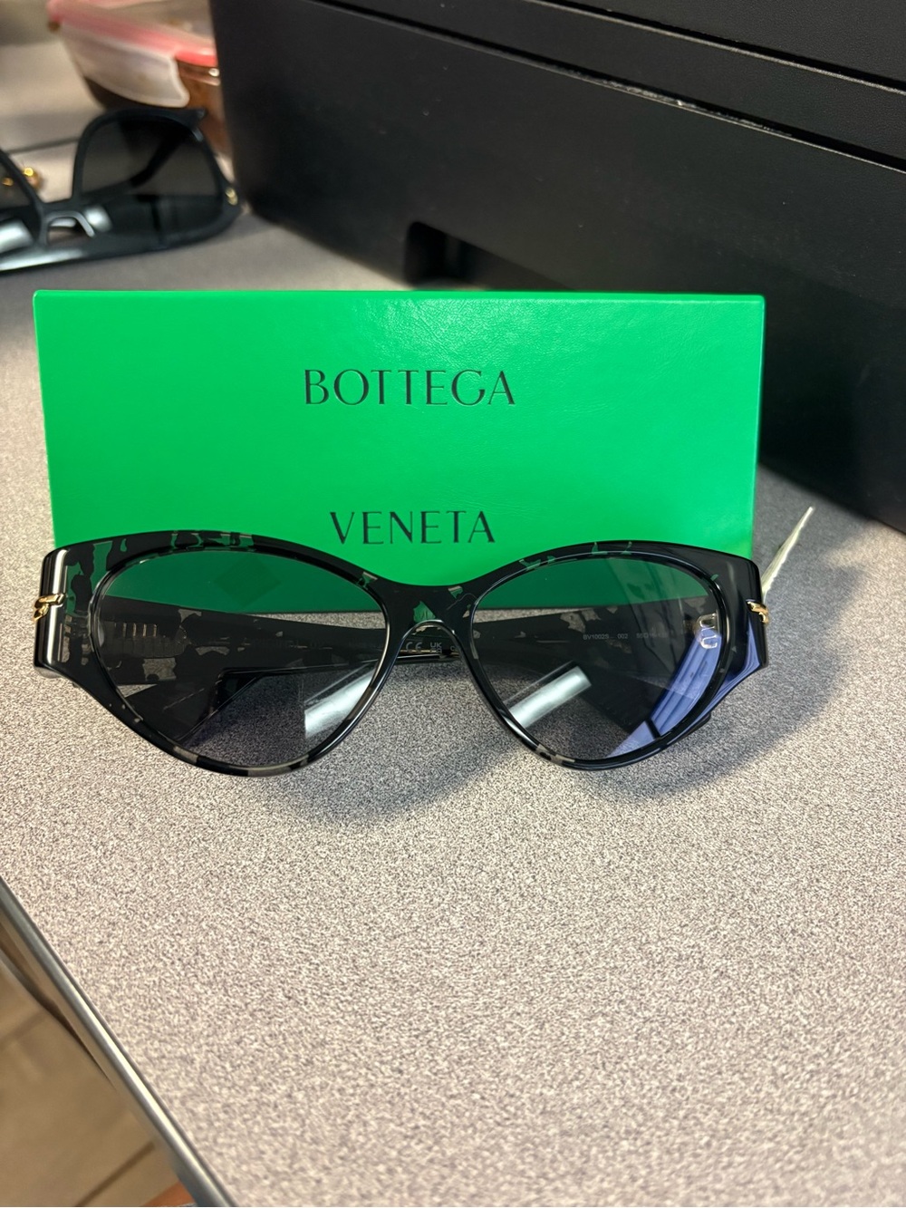 Bottega Veneta Black Cat-Eye Sunglasses with Gold Accents